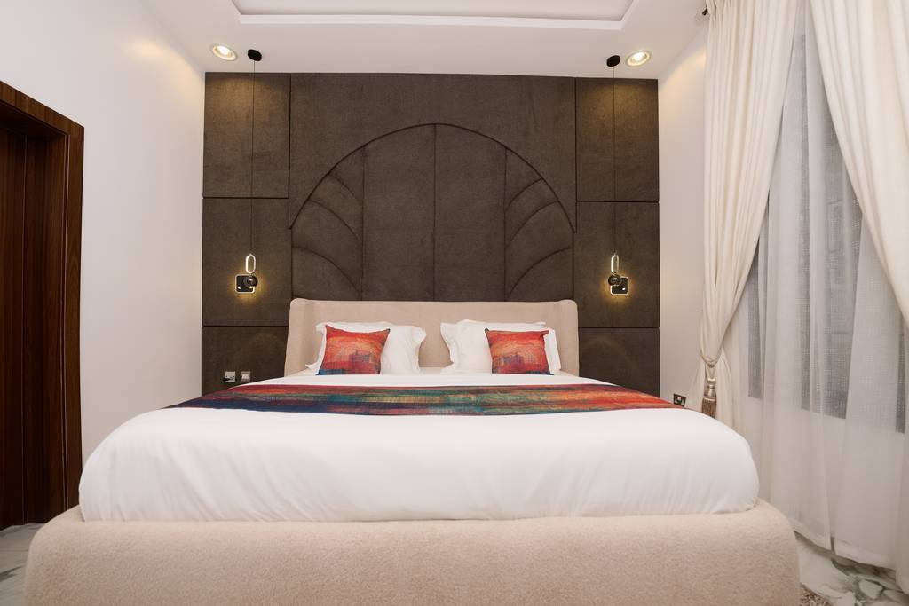 Executive Lodge master bedroom with king-size bed